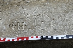 South end of West Range, door moulding concentric circles, letters IH