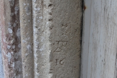 Priest's door jamb:  initials I, G and possible  mason's or merchant mark
