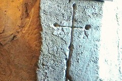 18. St Giles. Southeast face of the 3rd pillar from the west wall. A cross on a stand.