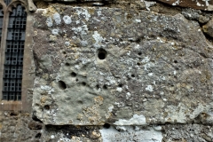 SD3) Porch outer south wall west end.  A scratch dial.