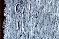 M18) Ringing chamber doorway, west side.  Initials GI, letters H & I.