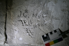 M25) Tower stairs mid-section. Various initials.