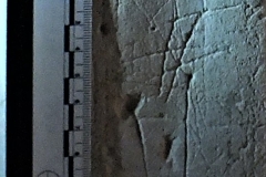 A4) Porch outer doorway west south face.  Various lines probably apotropaic.
