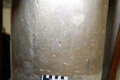 UA02) North rectangular pillar, west side.  Faint marks.
